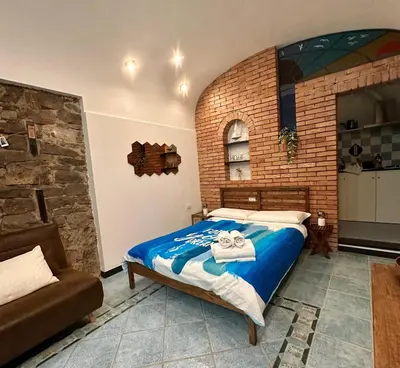 Letto o letti in una camera di Dal Ferroviere - A Charming Stone Retreat in Cinque Terre