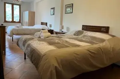 Letto o letti in una camera di Palazzo Mane