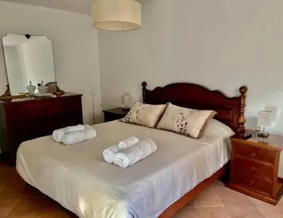 Letto o letti in una camera di Palazzo Mane