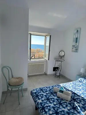 Letto o letti in una camera di Perla Marina