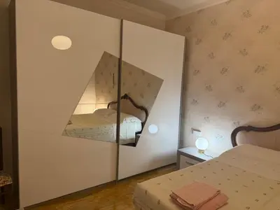 Letto o letti in una camera di La casa del papa'