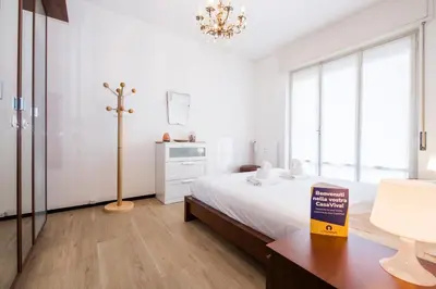 Letto o letti in una camera di CasaViva - Cozy Bilo with Parking in Rapallo