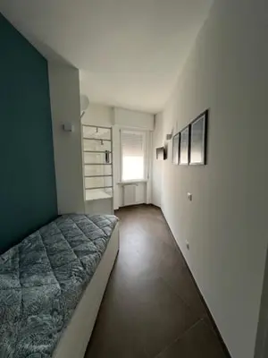 Letto o letti in una camera di Brunello Apartment