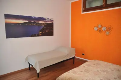 Letto o letti in una camera di Casa Otto