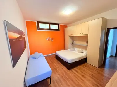 Letto o letti in una camera di Casa Otto