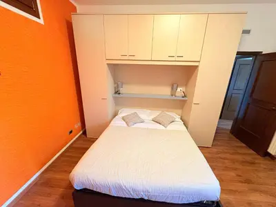 Letto o letti in una camera di Casa Otto