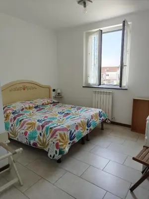 Letto o letti in una camera di Appartamento Iris