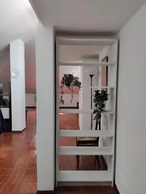 Letto o letti in una camera di viabado9 mansarda con box