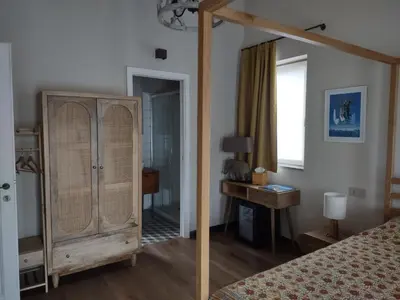 Letto o letti in una camera di Villa Sarita