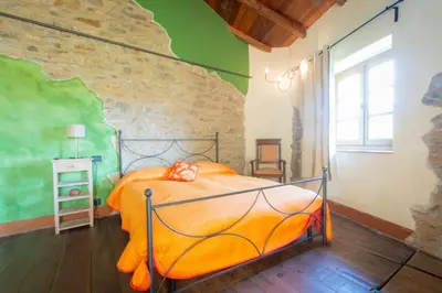 Letto o letti in una camera di Casa Vacanze La Casala