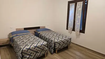 Letto o letti in una camera di Cà Mandarein