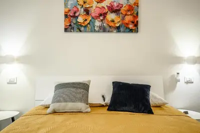 Letto o letti in una camera di College Suites