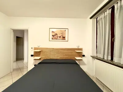 Letto o letti in una camera di Piacenza City House Garden