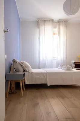 Letto o letti in una camera di CasaLucia alle porte del centro