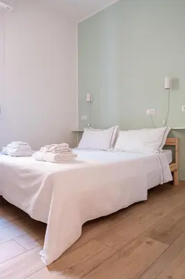 Letto o letti in una camera di CasaLucia alle porte del centro