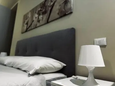 Letto o letti in una camera di Love me Bianca 2