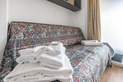 Letto o letti in una camera di GuestHost - Deiva Marina Sea House! Functional Apartment