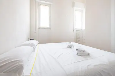 Letto o letti in una camera di GuestHost - Deiva Marina Sea House! Functional Apartment