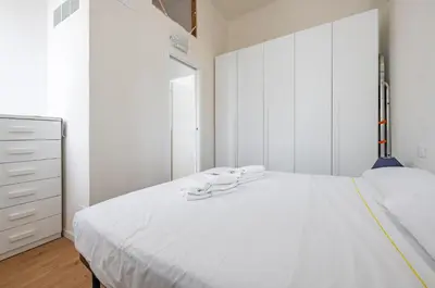 Letto o letti in una camera di GuestHost - Deiva Marina Sea House! Functional Apartment