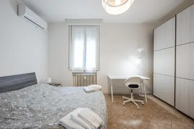 Letto o letti in una camera di Mutina Suite 3