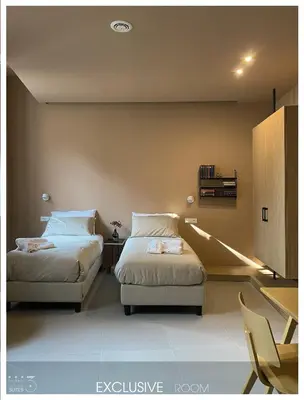 Letto o letti in una camera di San Paolo Design Suites