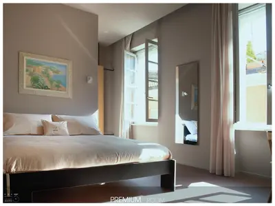 Letto o letti in una camera di San Paolo Design Suites