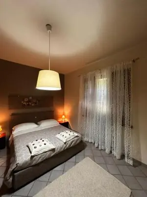 Letto o letti in una camera di Casa Vacanza Indipendente Cascina Cremasca with pool