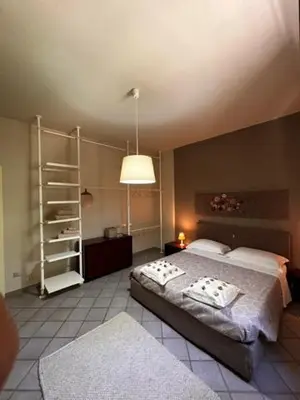 Letto o letti in una camera di Casa Vacanza Indipendente Cascina Cremasca with pool