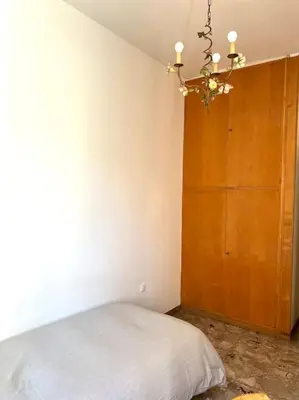 Letto o letti in una camera di Dimora Vittoria