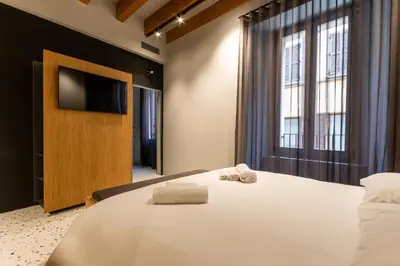 Letto o letti in una camera di Residenza San Longino