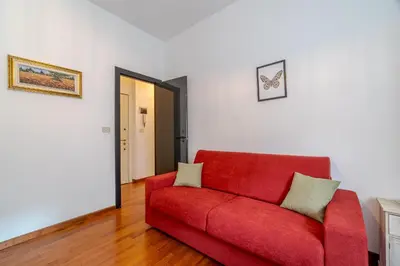 Area soggiorno di GuestHost - Castagneto Holiday & Relax Apartment