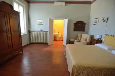 Letto o letti in una camera di Corte Fitti guest house