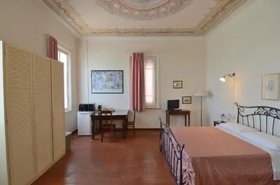 Letto o letti in una camera di Corte Fitti guest house