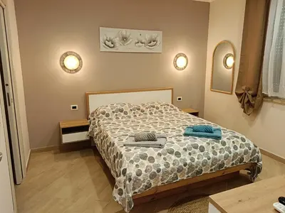 Letto o letti in una camera di Montanara3