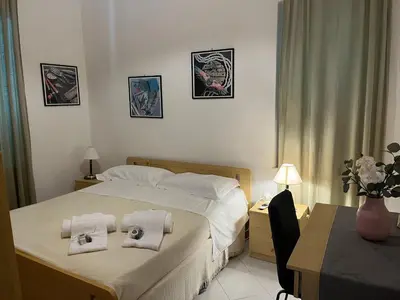 Letto o letti in una camera di CASA DONATELLA a pochi passi dal mare