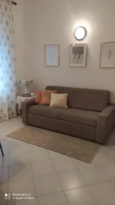Area soggiorno di CASA DONATELLA a pochi passi dal mare
