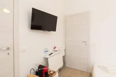 TV o dispositivi per l'intrattenimento presso Mentana Guest House