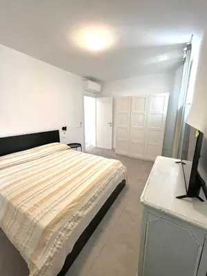 Letto o letti in una camera di Villino Aranci Nuovo Bilocale in centro