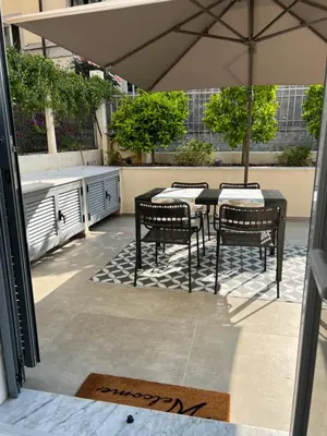 Balcone o terrazza di Villino Aranci Nuovo Bilocale in centro