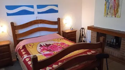 Letto o letti in una camera di La Pennica B&B
