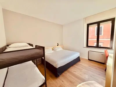 Letto o letti in una camera di Hotel Pex Mantova