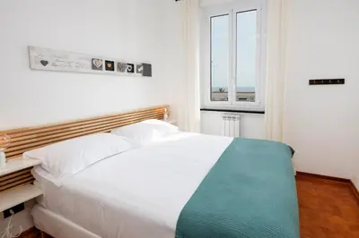 Letto o letti in una camera di Appartamento il Caruggio