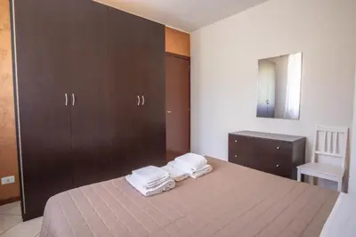 Letto o letti in una camera di Soggiorno in Valle