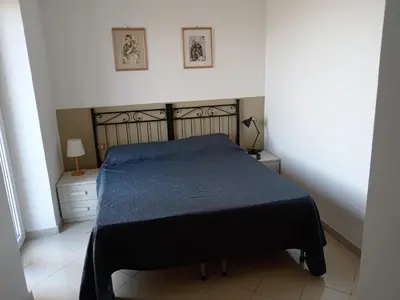 Letto o letti in una camera di Orizzonte spezzino