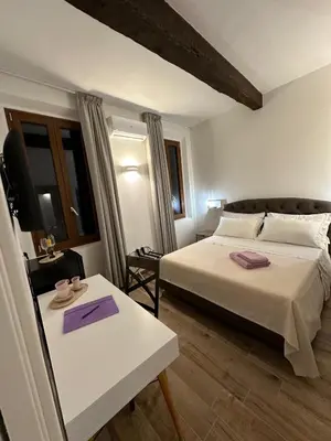 Letto o letti in una camera di Il Glicine
