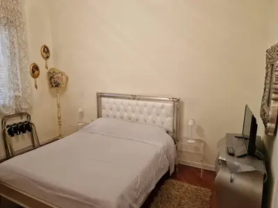 Letto o letti in una camera di Appartamenti INCORONATA