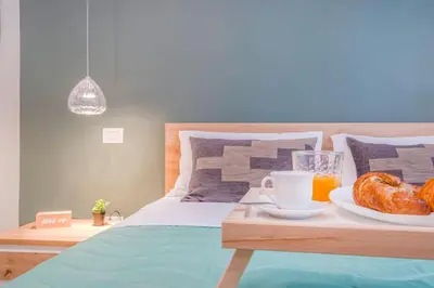Letto o letti in una camera di Modena Green Escape - In the Heart of MotorValley