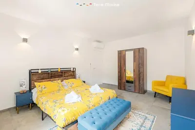 Letto o letti in una camera di Pietra Futura, TerreMarine