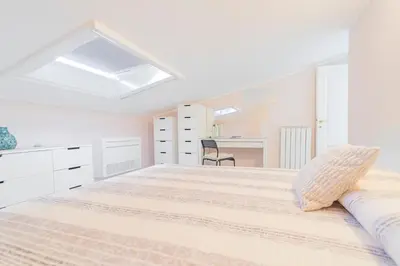 Letto o letti in una camera di La Mansarda sul Mare