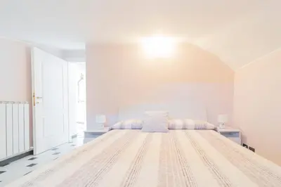 Letto o letti in una camera di La Mansarda sul Mare